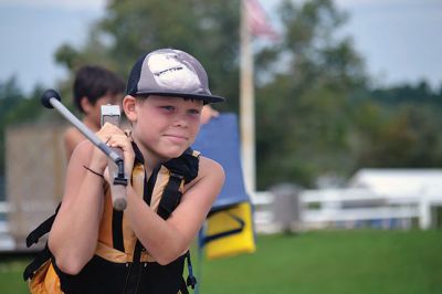 Happy Campers 
What's happening on a Tuesday morning at Camp Massasoit? It’s easier to ask what's not going on – swimming, boating, archery, crafts, exploring, wall climbing, ball playing, and that's all before they even break for lunch. Photos by Jonathan Comey
