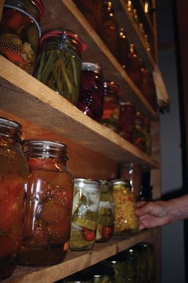 The Can-Do Couple 
Marion and Bob Faelten have been canning together for 50 years, ‘preserving’ the good life and enjoying every step of the twelve-month tango they dance from early spring when they sow their seeds to fall when they enjoy their homemade jellies, pickles, canned tomatoes, and homemade liqueurs. Photos by Jean Perry
