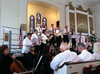 The Heart of Christmas
Marion’s First Congregational Church delivered the season’s perfection with Cassandra Morgan directing ‘The Heart of Christmas’ cantata. This annual event is sugar on the plums for anyone who appreciates live music.  The combined voices and instruments of over 60 performers filled the church with pitch perfect music telling the story of Jesus’ birth.  From bluesy pieces or full operatic compositions by Pepper Choplin the full house was delighted and moved tears to joy. Photo by Marilou Newell
