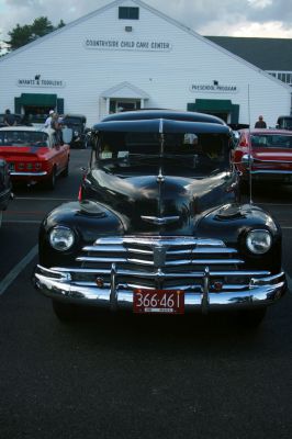 Downshifters’ Car Club
Every Monday at 5:00 pm in the parking lot of the Plumb Corner Mall in Rochester, the Downshifters’ Car Club of New England holds a Cruise Night, where dozens of automobiles from every decade are showcased to the public.  Photos by Katy Fitzpatrick 
