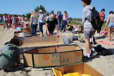 Cardboard Boats
Grade 7 students at Old Rochester Regional Junior High School took to the beach on Tuesday morning for a field day at the Mattapoisett YMCA that featured a cardboard boat race. The boats were designed entirely of cardboard and duct tape. The SCOPE program also included making tie-dye T-shirts. Photos by Mick Colageo
