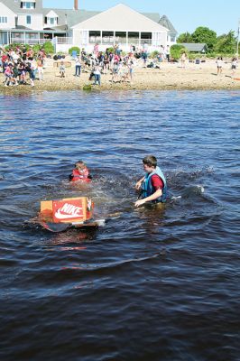 Cardboard Boats
Grade 7 students at Old Rochester Regional Junior High School took to the beach on Tuesday morning for a field day at the Mattapoisett YMCA that featured a cardboard boat race. The boats were designed entirely of cardboard and duct tape. The SCOPE program also included making tie-dye T-shirts. Photos by Mick Colageo

