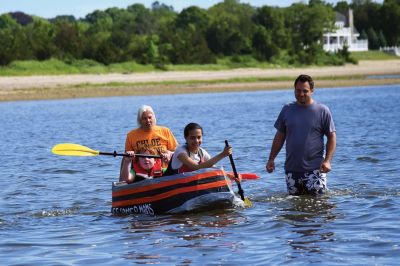 The Scoop on S.C.O.P.E. 
ORRJHS 7th-grade students participated in the annual S.C.O.P.E. cardboard boat race at the beach at the Mattapoisett YMCA last Wednesday, June 20. The students engineer and build their boats – some sink, some sail – and this year team “Funky Monkey” came in first place. There were 15 boats in all this year, all created by teams of four. Photos by Glenn C. Silva
