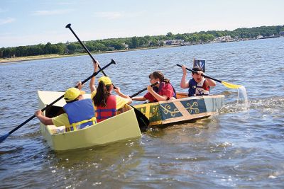 The Scoop on S.C.O.P.E. 
ORRJHS 7th-grade students participated in the annual S.C.O.P.E. cardboard boat race at the beach at the Mattapoisett YMCA last Wednesday, June 20. The students engineer and build their boats – some sink, some sail – and this year team “Funky Monkey” came in first place. There were 15 boats in all this year, all created by teams of four. Photos by Glenn C. Silva
