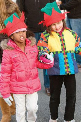Christmas Caroling 
Children created crafts then hit the streets for some old-fashioned Christmas caroling on Sunday, December 5, 2010. The event was sponsored by the Mattapoisett Historical Society. Photos by Felix Perez.
