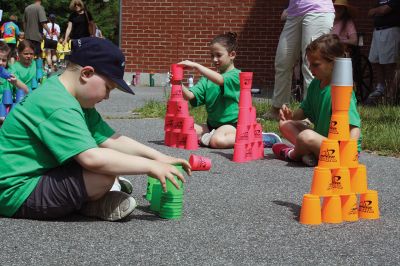 Center School Field Day
It turned out to be a gorgeous day on Tuesday, June 7, for the annual Center School Field Day activities. Relay races, hula hoops, cup stacking, parachute tossing, and even bubble-blowing kept the students busy and active across the school grounds in a constant whirlwind of motion and color. Photos by Jean Perry
