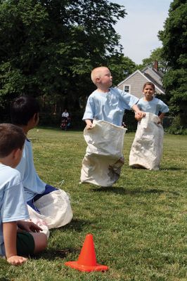 Center School Field Day
It turned out to be a gorgeous day on Tuesday, June 7, for the annual Center School Field Day activities. Relay races, hula hoops, cup stacking, parachute tossing, and even bubble-blowing kept the students busy and active across the school grounds in a constant whirlwind of motion and color. Photos by Jean Perry
