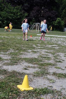 Center School Field Day
It turned out to be a gorgeous day on Tuesday, June 7, for the annual Center School Field Day activities. Relay races, hula hoops, cup stacking, parachute tossing, and even bubble-blowing kept the students busy and active across the school grounds in a constant whirlwind of motion and color. Photos by Jean Perry
