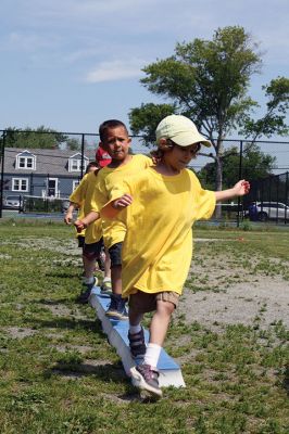 Center School Field Day
It turned out to be a gorgeous day on Tuesday, June 7, for the annual Center School Field Day activities. Relay races, hula hoops, cup stacking, parachute tossing, and even bubble-blowing kept the students busy and active across the school grounds in a constant whirlwind of motion and color. Photos by Jean Perry
