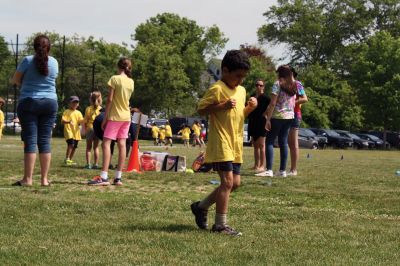Center School Field Day
It turned out to be a gorgeous day on Tuesday, June 7, for the annual Center School Field Day activities. Relay races, hula hoops, cup stacking, parachute tossing, and even bubble-blowing kept the students busy and active across the school grounds in a constant whirlwind of motion and color. Photos by Jean Perry
