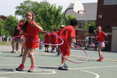 Center School Field Day
It turned out to be a gorgeous day on Tuesday, June 7, for the annual Center School Field Day activities. Relay races, hula hoops, cup stacking, parachute tossing, and even bubble-blowing kept the students busy and active across the school grounds in a constant whirlwind of motion and color. Photos by Jean Perry
