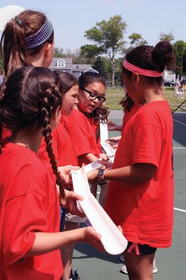 Center School Field Day
It turned out to be a gorgeous day on Tuesday, June 7, for the annual Center School Field Day activities. Relay races, hula hoops, cup stacking, parachute tossing, and even bubble-blowing kept the students busy and active across the school grounds in a constant whirlwind of motion and color. Photos by Jean Perry
