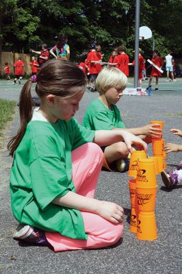 Center School Field Day
It turned out to be a gorgeous day on Tuesday, June 7, for the annual Center School Field Day activities. Relay races, hula hoops, cup stacking, parachute tossing, and even bubble-blowing kept the students busy and active across the school grounds in a constant whirlwind of motion and color. Photos by Jean Perry
