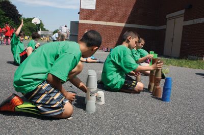 Center School Field Day
It turned out to be a gorgeous day on Tuesday, June 7, for the annual Center School Field Day activities. Relay races, hula hoops, cup stacking, parachute tossing, and even bubble-blowing kept the students busy and active across the school grounds in a constant whirlwind of motion and color. Photos by Jean Perry
