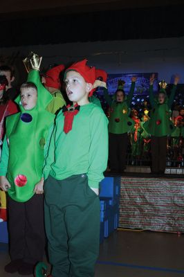 Sparkle and Shine
Center School’s first, second, and third graders treated their classmates and teachers to their annual holiday performance in the gymnasium on Monday, December 21. The students presented “Sparkle and Shine,” a musical celebrating the light at the top of the tree. Photos by Jean Perry
