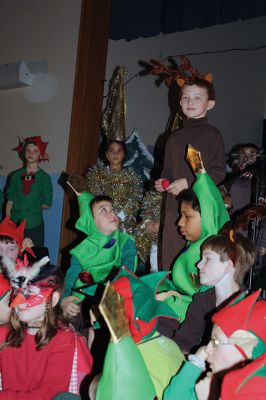 Sparkle and Shine
Center School’s first, second, and third graders treated their classmates and teachers to their annual holiday performance in the gymnasium on Monday, December 21. The students presented “Sparkle and Shine,” a musical celebrating the light at the top of the tree. Photos by Jean Perry
