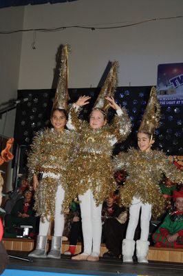 Sparkle and Shine
Center School’s first, second, and third graders treated their classmates and teachers to their annual holiday performance in the gymnasium on Monday, December 21. The students presented “Sparkle and Shine,” a musical celebrating the light at the top of the tree. Photos by Jean Perry
