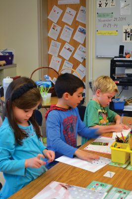 Sergeant Kasey Koch
The Center School students in Jennifer Aarsheim’s first grade class spent the afternoon on November 24 making thank you cards addressed to Sergeant Kasey Koch serving in Afghanistan, who is connected to some local troops who also served in Afghanistan. The students put together care packages as a way to say thank you to our troops this Thanksgiving. Photos by Jean Perry
