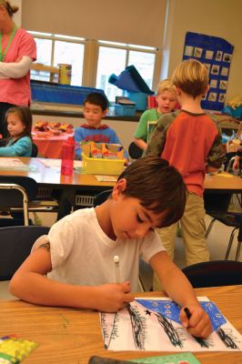 Sergeant Kasey Koch
The Center School students in Jennifer Aarsheim’s first grade class spent the afternoon on November 24 making thank you cards addressed to Sergeant Kasey Koch serving in Afghanistan, who is connected to some local troops who also served in Afghanistan. The students put together care packages as a way to say thank you to our troops this Thanksgiving. Photos by Jean Perry
