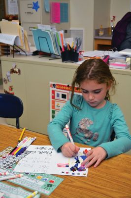 Sergeant Kasey Koch
The Center School students in Jennifer Aarsheim’s first grade class spent the afternoon on November 24 making thank you cards addressed to Sergeant Kasey Koch serving in Afghanistan, who is connected to some local troops who also served in Afghanistan. The students put together care packages as a way to say thank you to our troops this Thanksgiving. Photos by Jean Perry
