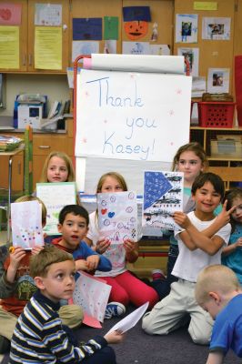 Sergeant Kasey Koch
The Center School students in Jennifer Aarsheim’s first grade class spent the afternoon on November 24 making thank you cards addressed to Sergeant Kasey Koch serving in Afghanistan, who is connected to some local troops who also served in Afghanistan. The students put together care packages as a way to say thank you to our troops this Thanksgiving. Photos by Jean Perry
