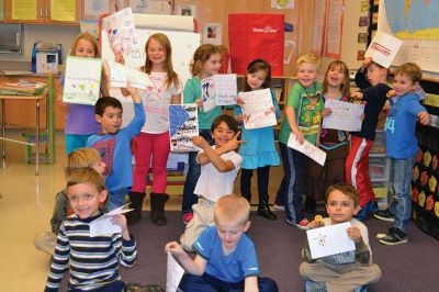 Sergeant Kasey Koch
The Center School students in Jennifer Aarsheim’s first grade class spent the afternoon on November 24 making thank you cards addressed to Sergeant Kasey Koch serving in Afghanistan, who is connected to some local troops who also served in Afghanistan. The students put together care packages as a way to say thank you to our troops this Thanksgiving. Photos by Jean Perry
