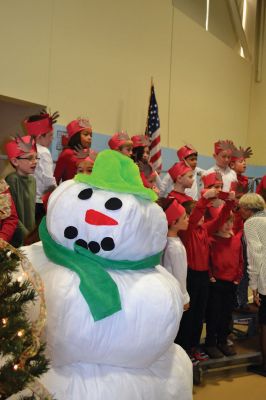 Center School's Annual Holiday Performance
Center School students presented their annual holiday performance to a gymnasium filled to capacity of family and friends on December 18. In addition to Christmas, the three holidays and traditions of Hanukkah, Kwanza, and Mexican “Posadas” were represented in the show. Photos by Jean Perry
