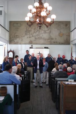 Sea Chantey
The Mattapoisett Museum and Carriage House hosted The New Bedford Sea Chantey Chorus on Sunday afternoon, April 29. The matinee concert featuring a variety of ballads, folk songs and work songs - or chanteys - was played before a full house as patrons filled the old church house to the rafters. Photo by Robert Chiarito

