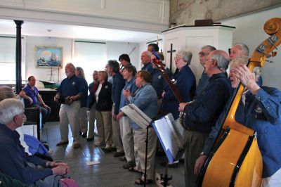 Chanty 7975
The Mattapoisett Museum and Carriage House hosted The New Bedford Sea Chantey Chorus on Sunday afternoon, April 29. The matinee concert featuring a variety of ballads, folk songs and work songs - or chanteys - was played before a full house as patrons filled the old church house to the rafters. Photo by Robert Chiarito
