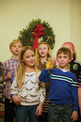 Tinkhamtown Chapel Christmas
The spirit of Christmas came to Mattapoisett on December 19 by way of Christmas caroling at the annual Tinkhamtown Chapel Christmas carol sing. The little chapel was filled with the voices of those who keep this decades-old tradition alive and pass it on to the next generation. Photos by Colin Veitch
