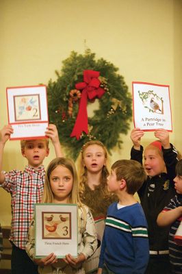 Tinkhamtown Chapel Christmas
The spirit of Christmas came to Mattapoisett on December 19 by way of Christmas caroling at the annual Tinkhamtown Chapel Christmas carol sing. The little chapel was filled with the voices of those who keep this decades-old tradition alive and pass it on to the next generation. Photos by Colin Veitch
