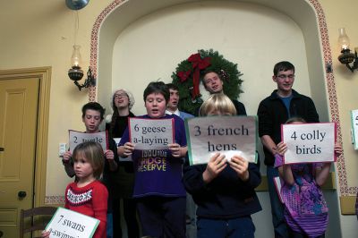 Tinkhamtown Chapel 
The sing-along enlisted the help of several youths from the audience to keep the audience on track with the order of verses from the epic classic holiday song, "The Twelve Days Of Christmas."  Photo by Eric Tripoli.
