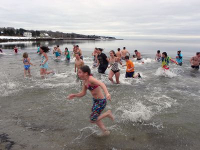 Christmas Swim
A 2009 Christmas morning swim benefitted Helping Hands and Hooves, a Mattapoisett non-profit organization dedicated to therapeutic horseback riding for adults with disabilities. 40 swimmers and at least 50 onlookers participated in the 2009 swim. All of the proceeds from the event went to Helping Hands and Hooves. Photo courtesy of Debbi Dyson.
