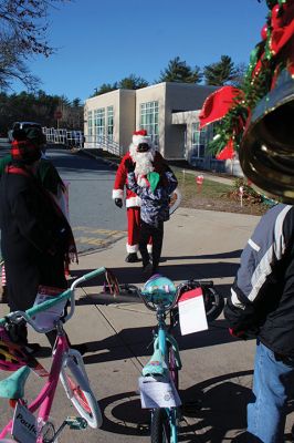 Fill-A-Cruiser Toy Drive
Sunday’s Fill-A-Cruiser toy drive at Sippican Elementary School was a success! Volunteers representing the Marion Police Department, Police Brotherhood, and Sippican School (VASE) welcomed a parade of vehicles of families dropping off a variety of Christmas gifts for cookies and cupcakes. Marion Police Chief John Garcia donned the Santa suit and took pictures with kids in school resource officer Matt McGraw’s 1924 Ford Model-T. Photos by Mick Colageo
