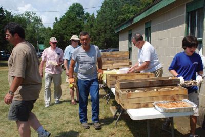 The Big Bake
Michael Lamoureux of the American Legion Florence Eastman Post 220 called the August 8, 2010 clambake a gigantic success. Close to 240 people came to enjoy an old-fashioned clambake with the Lions Club, the Mattapoisett Boy Scout Troop 53, Mattapoisett firefighters, and the Firefighters Auxiliary Club all pitching in to help. Photos by Lynn Short.
