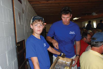 The Big Bake
Michael Lamoureux of the American Legion Florence Eastman Post 220 called the August 8, 2010 clambake a gigantic success. Close to 240 people came to enjoy an old-fashioned clambake with the Lions Club, the Mattapoisett Boy Scout Troop 53, Mattapoisett firefighters, and the Firefighters Auxiliary Club all pitching in to help. Photos by Lynn Short.
