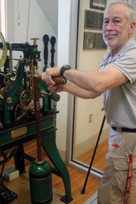 Center School Clock
Behind the clock that faces all four directions at Center School are three levels of mechanics that make the hands move, the bell ring and the machine operate. The clock serves as an in-house museum for schoolchildren to learn about how things worked before the digital age. Photos by Mick Colageo
