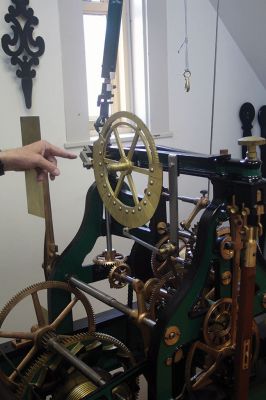 Center School Clock
Behind the clock that faces all four directions at Center School are three levels of mechanics that make the hands move, the bell ring and the machine operate. The clock serves as an in-house museum for schoolchildren to learn about how things worked before the digital age. Photos by Mick Colageo
