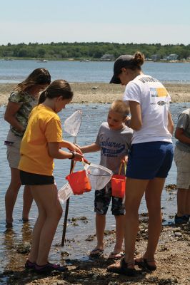 Shining Tides in Mattapoisett
Children explored the shore with Cassie Lawson and Becca Stroud from the Buzzards Bay Coalition on July 31 at Shining Tides in Mattapoisett, enjoying a scavenger hunt along with the exploration of sea animal habitats. Photos by Jean Perry
