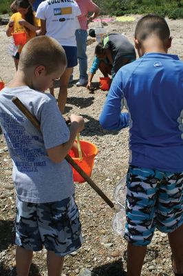 Shining Tides in Mattapoisett
Children explored the shore with Cassie Lawson and Becca Stroud from the Buzzards Bay Coalition on July 31 at Shining Tides in Mattapoisett, enjoying a scavenger hunt along with the exploration of sea animal habitats. Photos by Jean Perry
