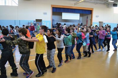 Manguito
Center School students were introduced to Latin rhythms and percussion instruments by the Boston-based educational Latin American music group Manguito during an afternoon presentation on January 24. Manguito members really captured the attention of the kids, resulting in plenty of learning while the group’s sizzling salsa and merengue music resulted in an eruption of dancing and spontaneous conga lines. Photo by Jean Perry
