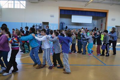 Manguito
Center School students were introduced to Latin rhythms and percussion instruments by the Boston-based educational Latin American music group Manguito during an afternoon presentation on January 24. Manguito members really captured the attention of the kids, resulting in plenty of learning while the group’s sizzling salsa and merengue music resulted in an eruption of dancing and spontaneous conga lines. Photo by Jean Perry
