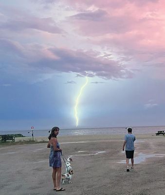 Lightning
Jonathan Craig took this picture at Hiller Cove after the storm on August 9. Julie and Ian Craig are in the pictures, along with dogs Opal, Ginger and Nelson.
