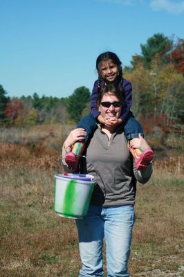 Cranberry Outing
Perfect weather brought out the young and the young at heart to the second annual cranberry harvest at “The Bogs” on Acushnet Road in Mattapoisett, a Buzzards Bay Coalition property. The retired bog acreage is slowly returning to meadows and woodlands. But for now cranberries continue to grow giving the do-it-yourself harvester a chance to enjoy nature’s bounty. Photos by Marilou Newell
