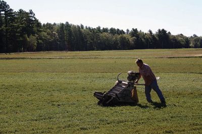 Dry Harvest
It’s cranberry season in Southeastern Massachusetts. With drought conditions, dry harvesting the berries has started largely unaffected by the lack of water thus far, but bog flooding later in the season could be affected if water sources are not replenished with rain. Paula and Dana Johnson of Rochester are in the midst of their dry pick, circling the bogs, one after the other, day in and day out with their mechanical Furfords and burlap sacks to harvest the cranberries fit for fresh fruit sale. 
