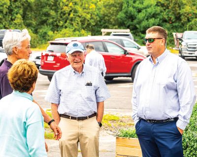 Marion Council on Aging
Merry Conway, president of the Friends of the Marion Council on Aging, cuts the ribbon officially opening the new Walking Path at the Cushing Community Center on September 24. From left: Town Administrator Jay McGrail, Select Board member Randy Parker, Merry Conway, COA Chair Harry Norweb, Administrative Assistant Donna Hemphill, Select Board Chair Norm Hills, and Community Preservation Committee Chair Jeff Doubrava. Photos by Ryan Feeney
