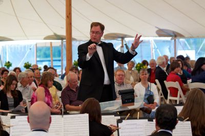 Three Generations of Disney
Conductor and musical director Philip Sanborn lead the Tri-County Symphonic Band in a concert of famous music from Disney films, at Tabor Academy, on Sunday, June 17, 2012.  The concert was a benefit to raise money for various musical scholarships that are awarded to area students.  Photo by Eric Tripoli.  
