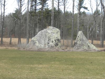 Split Rock
Split Rock, a large rock in the private Bay Club community, marks one of the entrances to the Tinkham Forest. At the March 23, 2010 Mattapoisett Board of Selectmen meeting, the Board agreed to help the Friends of the Tinkham Forest gain two more points of access to the public forest, which is landlocked by the gated community. Photo by Paul Lopes.
