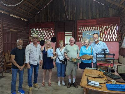 Vinales, Cuba 
Joe Jacintho (Fairhaven), Jean Fuller Gest (Marion), Bette-Jean and Bruce Rocha (Mattapoisett), Deb and Mike Dahill (Mattapoisett) visit with renown tobacco farmer, Montesino, at his farm in Vinales, Cuba where he produces cigars for Cohiba. Nov. 8, 2023. Photo courtesy Deb Dahill
