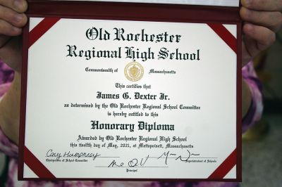 Jimmy Dexter
Jimmy Dexter received his long-awaited Old Rochester Regional High School honorary diploma from Superintendent of Schools Mike Nelson and ORR Principal Mike Devoll during an August 26 luncheon held at the Rochester Senior Center. Andrew Daniel, Rochester facilities manager who was instrumental in bringing the petition to Nelson’s attention, and Dexter’s sister Debbie Townsend both shared words with the packed house that turned out in Dexter’s honor. 
